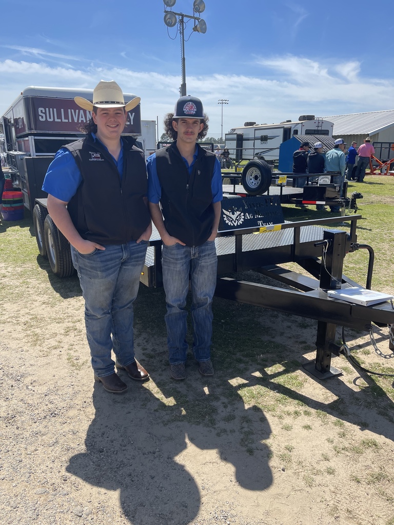 students in front of trailer